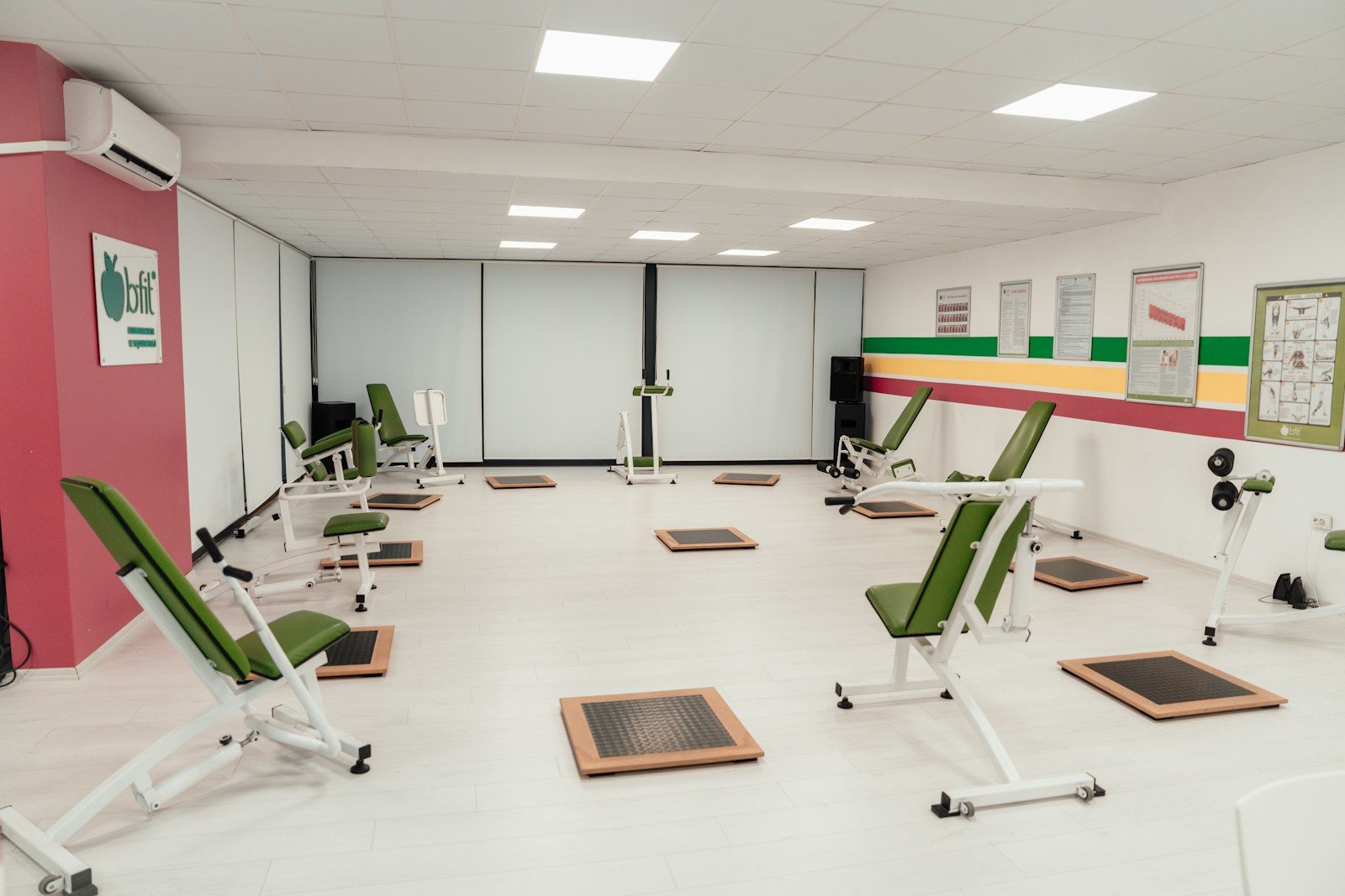 a room that has a bunch of chairs in it